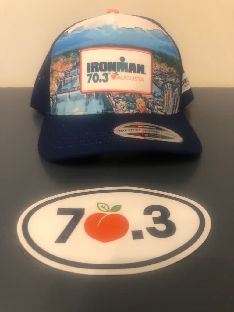 IRONMAN 70.3 Augusta trucker hat and peach-logo sticker